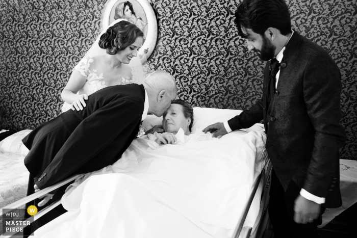 wedding photo from Grandmother's house, Paceco - Sicily of the bride and groom greeting to grandmother 