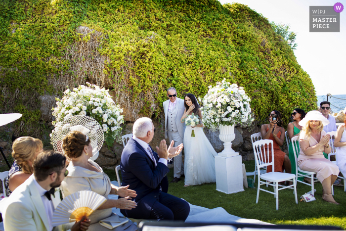 The bride arrives at the Castle Lanza di Trabia, emotions time in this wedding photo