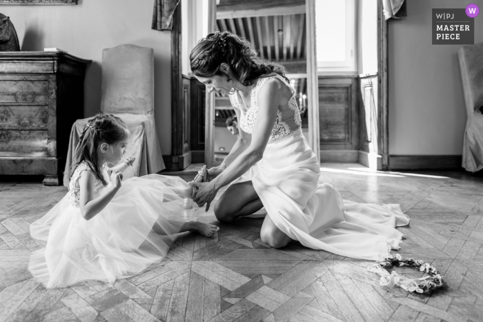 FR wedding photo from Château d'Epeyssoles France of the Bride and her daughter preparing for the ceremony