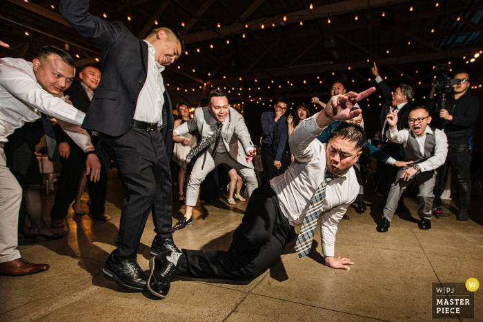 Wedding photography from a reception in San Jose, California of Guests partying before Pandemic