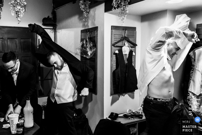 Colorado wedding photography from Bella Sera Event Center Brighton of groomsmen getting ready Colorado wedding photography from Bella Sera Event Center Brighton of groomsmen getting ready