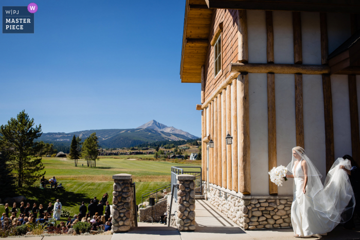 Wedding photo from Big Sky, Montana as the bride enters outdoor processional Wedding photo from Big Sky, Montana as the bride enters outdoor processional