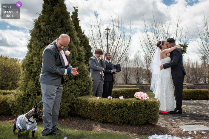 The Hacienda Sierra, Kitchener, Ontario wedding ceremony kiss between the bride and groom The Hacienda Sierra, Kitchener, Ontario wedding ceremony kiss between the bride and groom