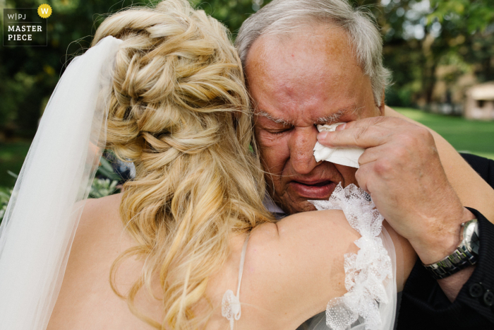 Bride with her grandfather in tears at Borgo San Luigi, Tuscany