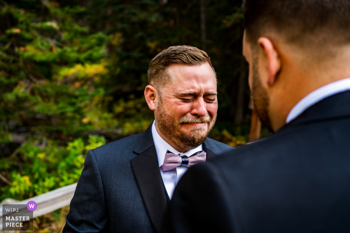 Groom gets emotional during first look at Maroon Bells, Aspen, CO 