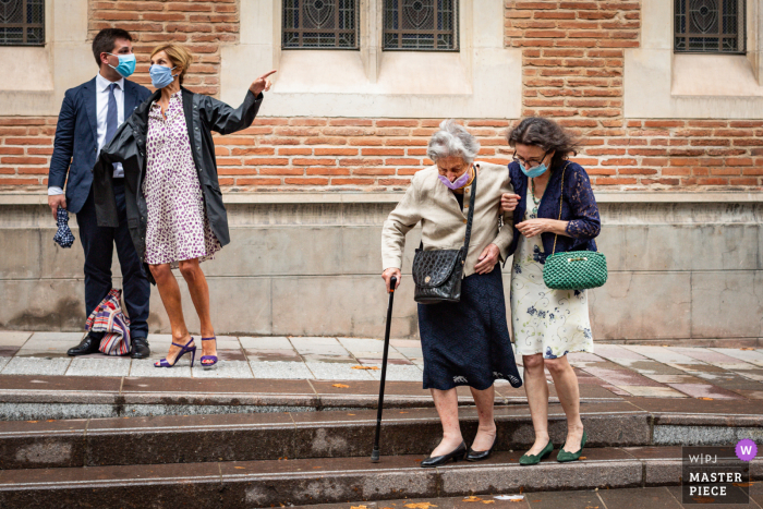 Wedding image of Protestant Temple, Toulouse, France Guests by pair getting ready to get to the right place