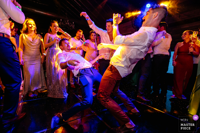 Emma Trein - Canela - Brazil wedding photography of the Groom and godfather dancing