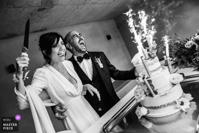 Montpellier, France wedding image of the bride and groom cutting the cake