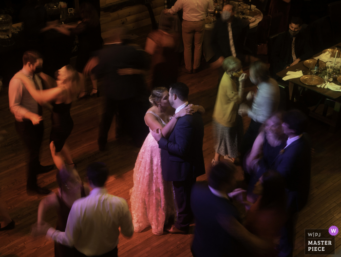 Photo by: <a href="https://www.wpja.com/contests/2020-v04/best-wedding-photographers/2602563">Jennifer Catron - Fredericksburg Virginia</a> Virginia wedding photography from Lydia Mountain Lodge/Stanardsville VA showing Dancing with a slow shutter motion blur