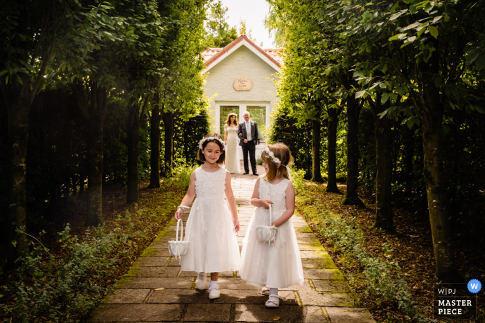 A Dublin wedding photographer captured this Cork, Ireland Arrival of the flower girls