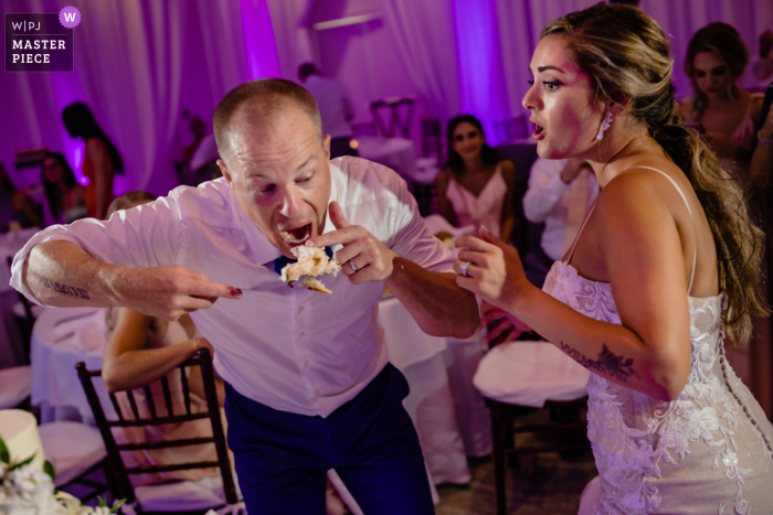 Islabella Resort, Florida Keys wedding picture of the groom, He didn't wait for the bride to cut it with him