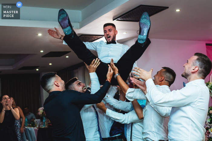 Wedding photo from Aglika Palace, Zhrebchevo, Bulgaria of the Groom and his friends enjoying the wedding party