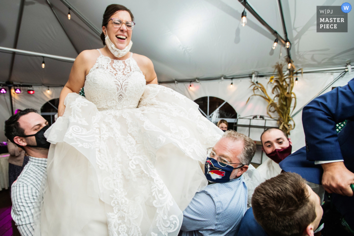 Wedding photo from Desmond Hotel Malvern, Pennsylvania showing the bride in a Hora dance during the reception dance party Wedding photo from Desmond Hotel Malvern, Pennsylvania showing the bride in a Hora dance during the reception dance party