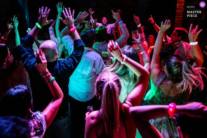 Photo by: <a href="https://www.wpja.com/contests/2020-v05/best-wedding-photographers/2610909">Renan Radici - Porto Alegre Rio Grande do Sul</a> Emma Trein, Canela, Brazil wedding photography - wedding guests partying and dancing
