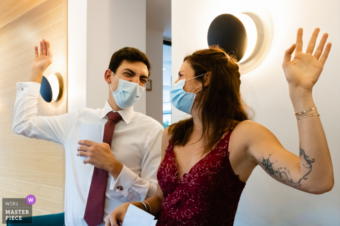 France wedding pic of guests laughing during a game 