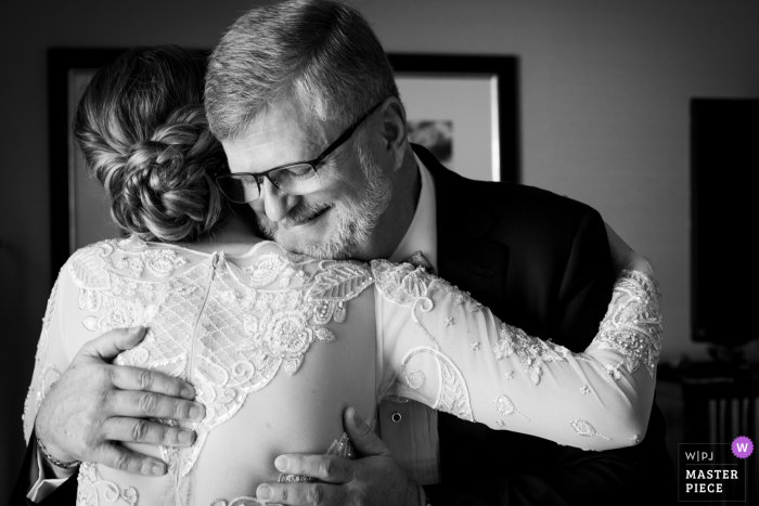 The Valentine, DTLA wedding photography of the bride hugging dad