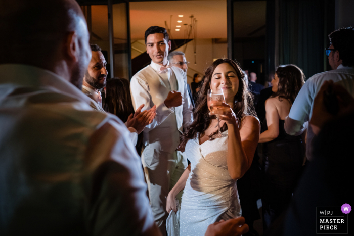 Nikki Beach Dubai wedding photo of the bride Partying with the guests Nikki Beach Dubai wedding photo of the bride Partying with the guests