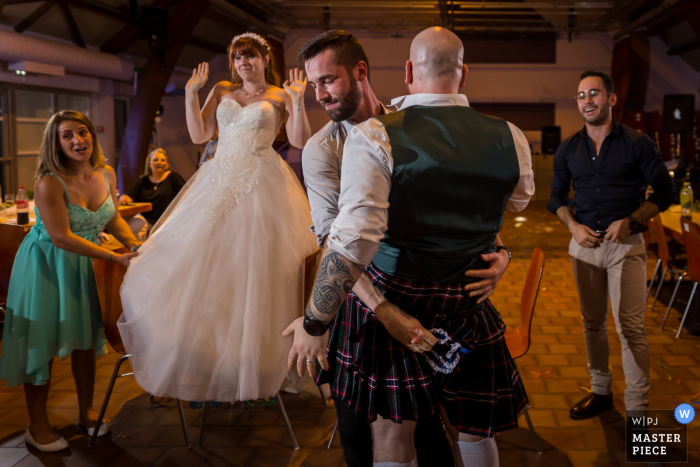 Bas-Rhin Reception wedding photography of the kilt game at the party Bas-Rhin Reception wedding photography of the kilt game at the party