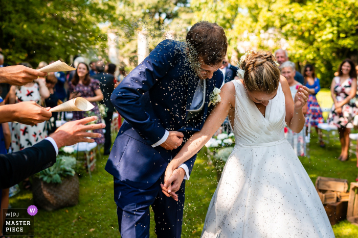 Castello di Strassoldo, Cervignano, Italy wedding photography of an outdoor garden Confetti moment