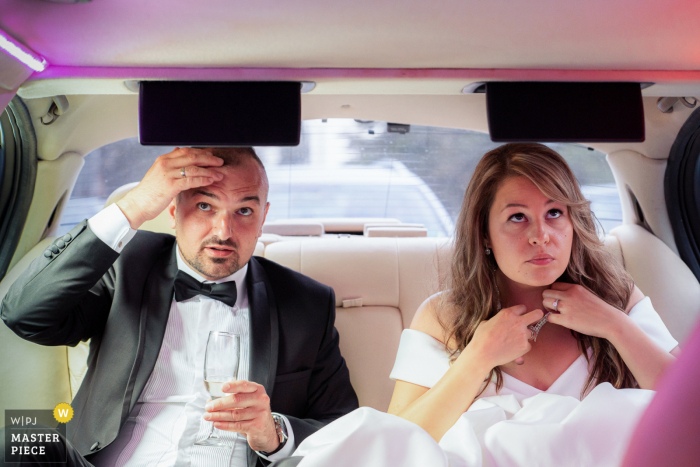 Bulgaria wedding photo showing The bride and groom getting ready by fixing the final touches of their appearance