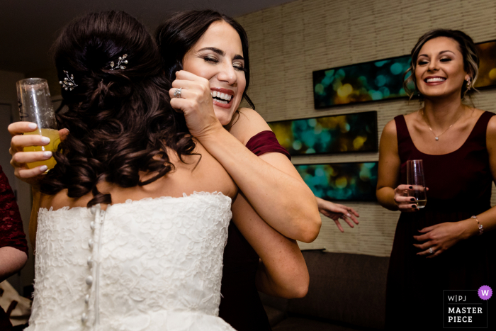 Philadelphia, Pennsylvania wedding photo of Congratulatory hugs from bridesmaids Philadelphia, Pennsylvania wedding photo of Congratulatory hugs from bridesmaids