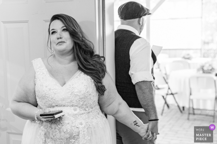 Best wedding photography from Lavender Ridge, Nevada showing a pic of a Beautiful moment during a first touch moment, Like a first look but did not see each other, they Just held hands and said special words