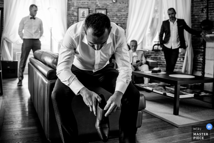 A Oise wedding photographer at Domaine du Colombier created this image of The groom and his men friends A Oise wedding photographer at Domaine du Colombier created this image of The groom and his men friends
