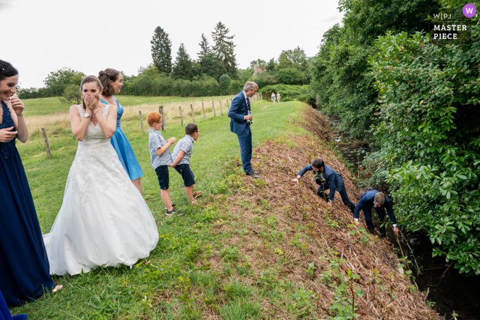 Couches, France outdoor marriage reception party award-winning photo that has recorded the Losing of guests