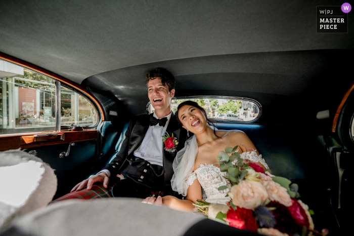 Camberwell church, Victoria, Australia nuptial day award-winning image from the back of the car when Finally married and released