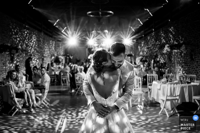 Marseille indoor wedding reception party award-winning picture showing the First dance in BW Marseille indoor wedding reception party award-winning picture showing the First dance in BW