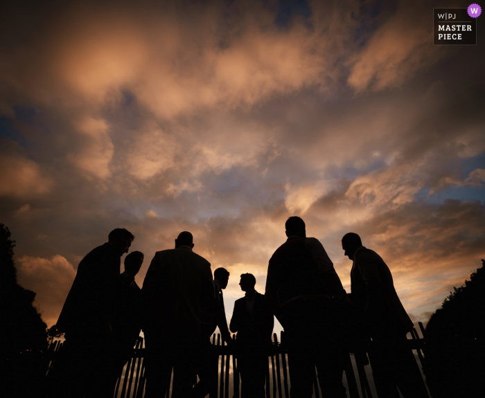 Photo by: <a href="https://www.wpja.com/contests/2021-v02/best-wedding-photographers/2632234">Robin Goodlad - Wimborne Minster Dorset</a> Tunnels Beaches outdoor marriage reception party award-winning photo that has recorded silhouette conversations