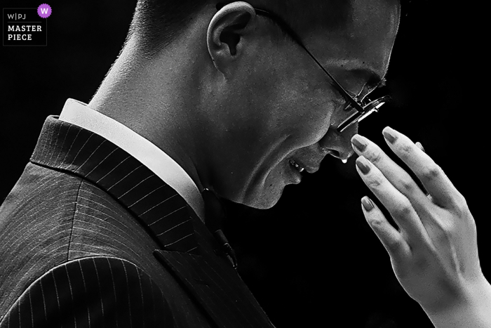 Beijing nuptial day award-winning image of groom Tears Beijing nuptial day award-winning image of groom Tears. The world's best wedding photography competitions are hosted by the WPJA