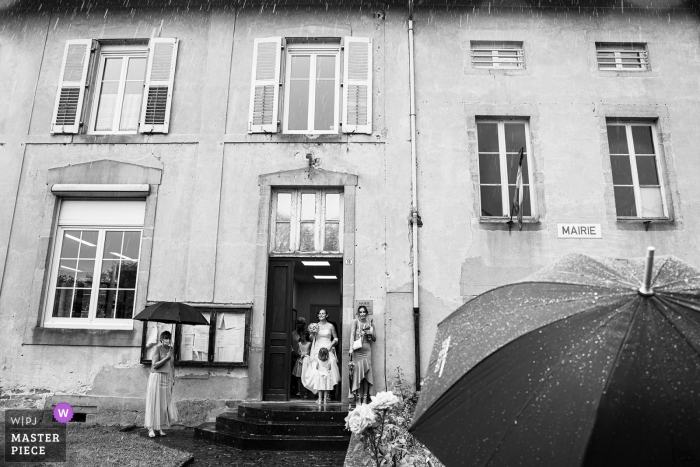 Grand Est nuptial day award-winning image a raining day but a big smile of the bride :)