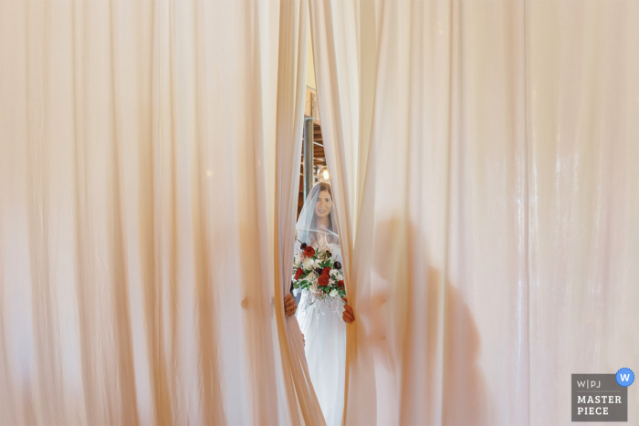 Denver, Colorado nuptial day award-winning image of the bride about to walk down aisle - from the world's best wedding photography competitions hosted by the WPJA