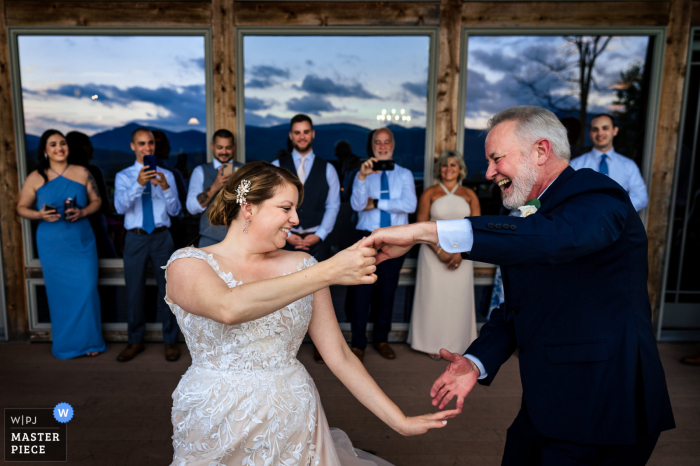 Photo by: <a href="https://www.wpja.com/contests/2021-v02/best-wedding-photographers/2634937">Jacob Hannah - Lincoln Vermont</a> Mountain Top Inn - Chittenden Vermont marriage reception party award-winning photo that has recorded The bride dancing with her dad - from the world's best wedding photography competitions offered by the WPJA