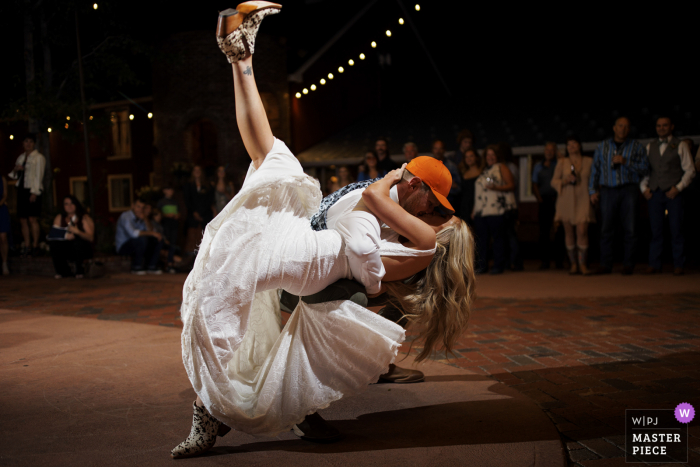 View this romantic moment at Crooked Willow Farms wedding picture of a dancing dip during their first dance together at their wedding reception