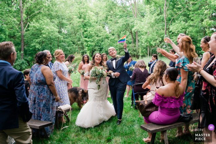 Virginia wedding reportage photojournalist created this image during an outdoor Ceremony at home