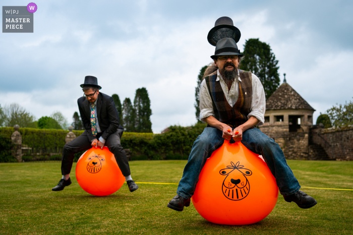 Best wedding photography from a Dorset venue, Hilton St Marys of Guests racing on space hoppers