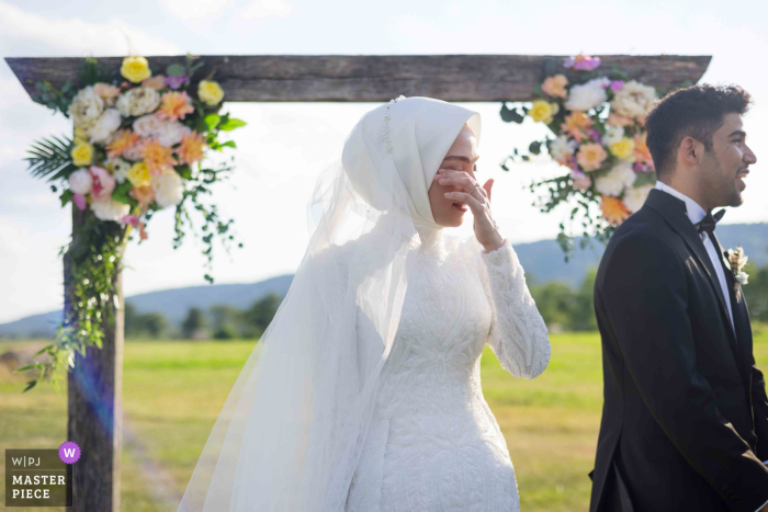 Virginia Vows: A Beautiful Outdoor Ceremony Makes the Bride Shed Happy Tears As the sun shone down on the beautiful outdoor ceremony, the bride couldn't hold back her tears at the altar in Virginia.