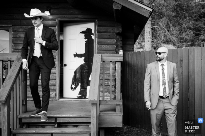In the Montana mountains, cowboys kick back and relax at 320 Ranch, celebrating in a picturesque rustic wedding venue.
