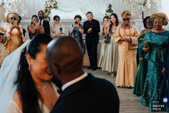 Newlywed's First Dance at Lovely Carr Bank in Nottinghamshire with Happy Guests Surrounded by loved ones at Carr Bank, Nottinghamshire, the newlyweds share their first dance as their guests look on with joy.