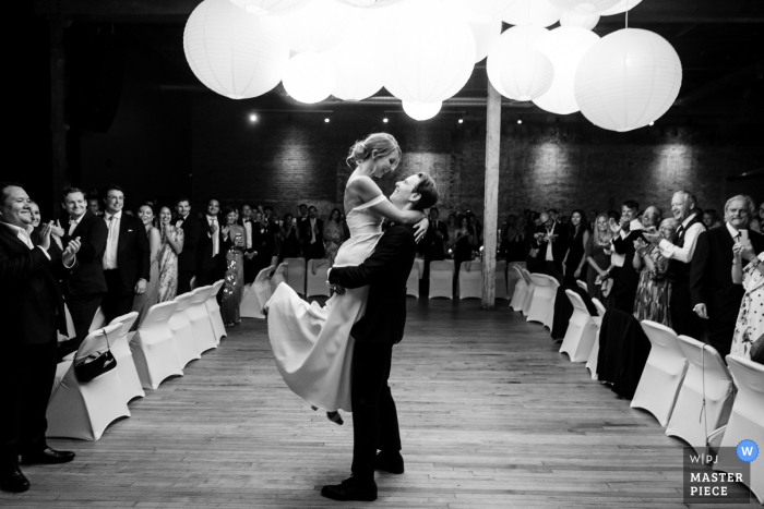 Capturing the intimate first dance at the reception in Great Falls, MT, this photo captures the timeless beauty of the moment.