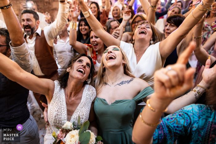 French Countryside Celebration: Weddings & Song at Les Tables de Crespin Amidst the beautiful French countryside at Les Tables de Crespin, the wedding party breaks into joyous song, capturing the spontaneous and lively spirit of the day.