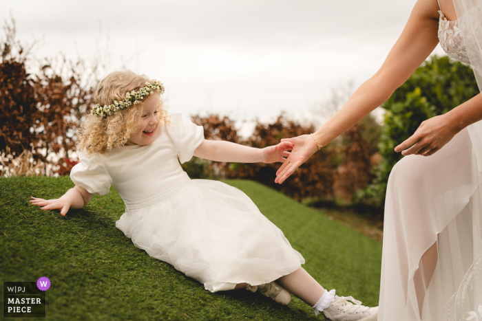Bride's Tender Embrace with Daughter at Clanard Court Wedding Morning Preparations At Clanard Court Hotel, the bride shares a tender morning moment with her daughter during wedding preparations before the ceremony.