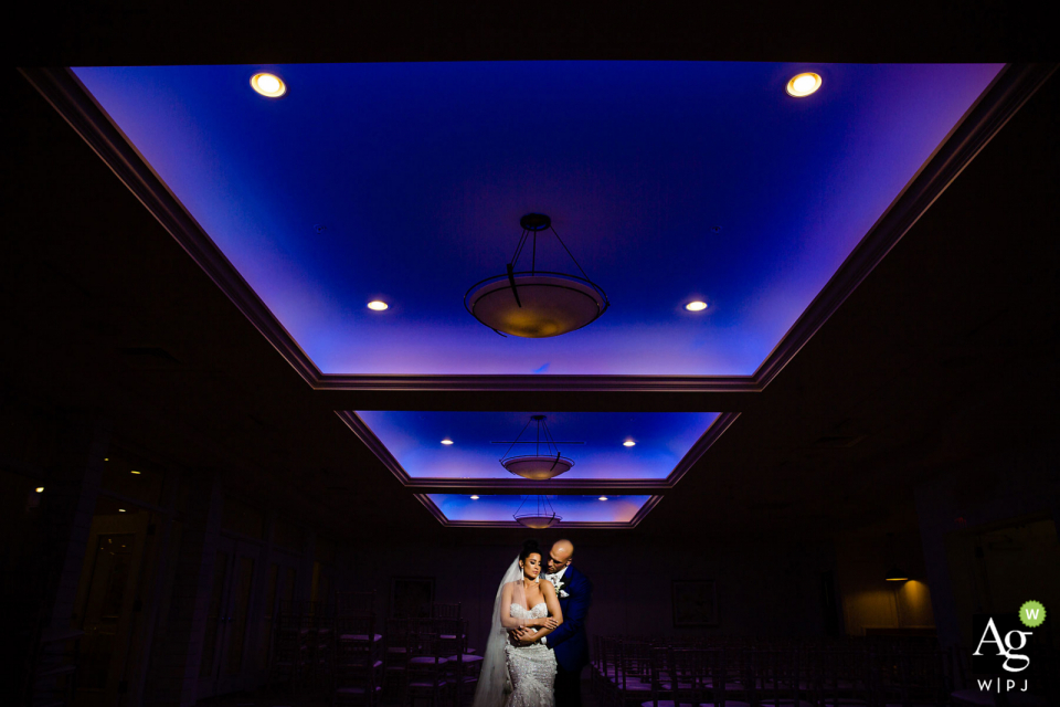 Icona Avalon wedding venue photo | Using the color up top creatively during a portrait session with the bride and groom