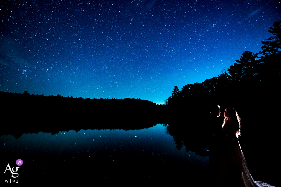 Photo by: <a href="https://www.wpja.com/photos/artistic-wedding-photographers/2573027">Jesse La Plante - Boulder Colorado Forest Lake Camp (Upstate New York) Wedding Portait Session at Night. | Bride and groom under the stars