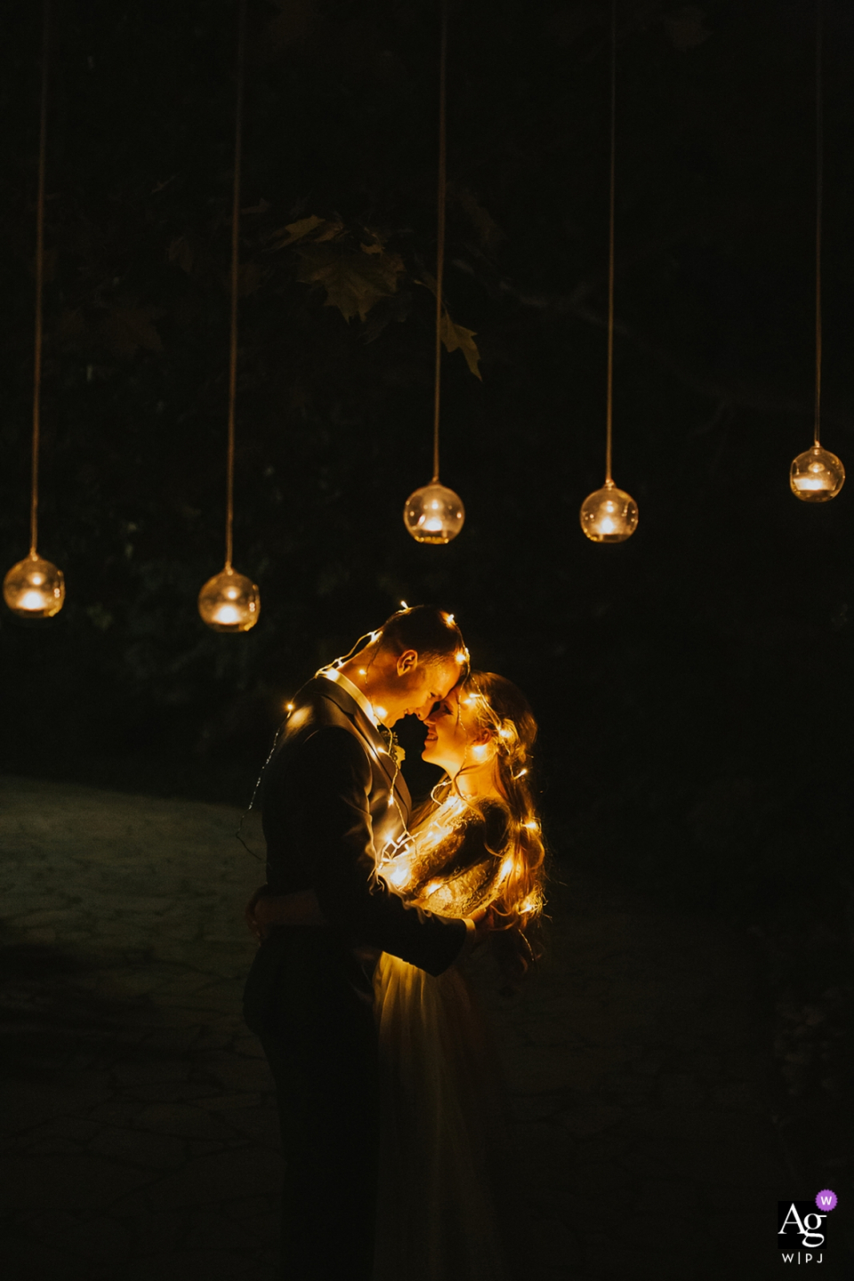 Castle Mierovo, Bratislava, Slovakia Bride and Groom portrait with soft, hanging lights at night