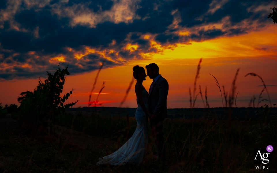 Photo by: <a href="https://www.wpja.com/photos/artistic-wedding-photographers/2576429">Isabelle Bazin - Goutz Reception Venue at Chateau de Malliac, France | Couple portrait after wedding in the sunset