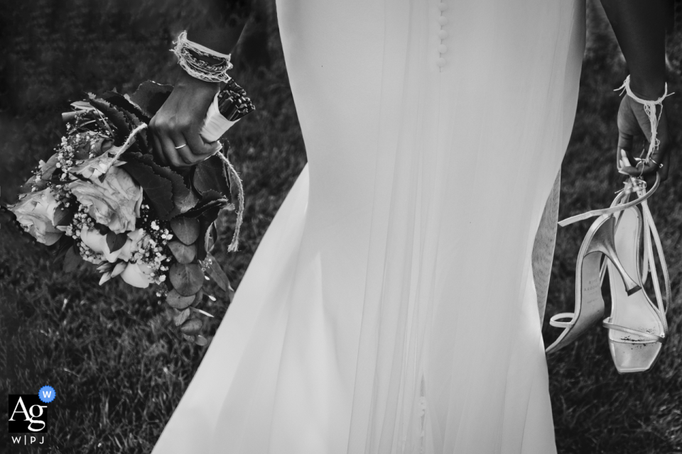 Photo by: <a href="https://wpja.com/photos/artistic-wedding-photographers/2669740">Gaelle Caré - Châteauroux Indre (36) The bride's bouquet and shoes at the cocktail party from Dangy Castle