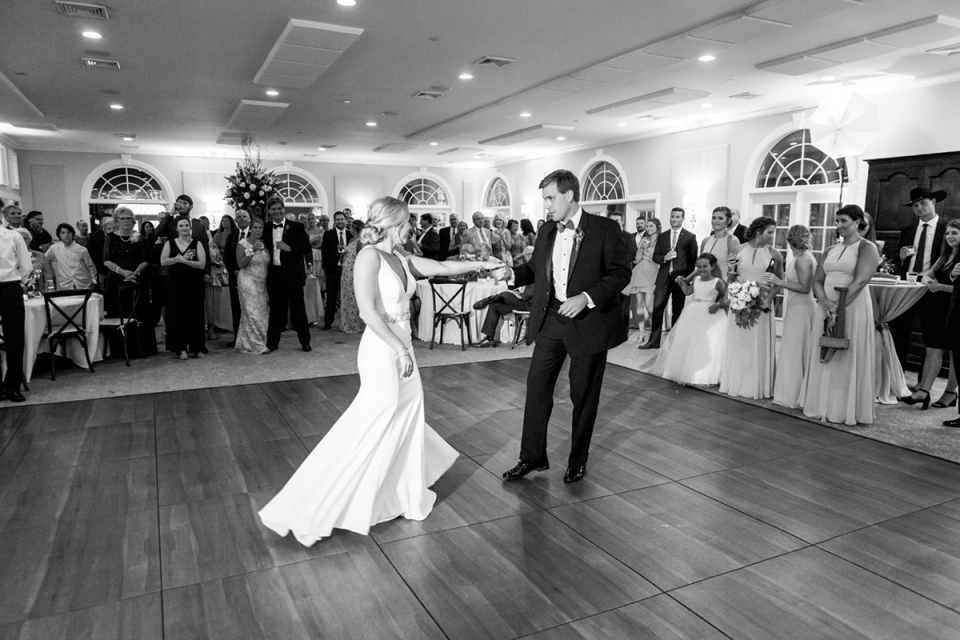 Murrells Inlet, SC black and white wedding picture of the bride and groom dancing together at the Wachesaw Plantation Wachesaw Plantation, Murrells Inlet, SC BW wedding image of the bride and groom dancing together
